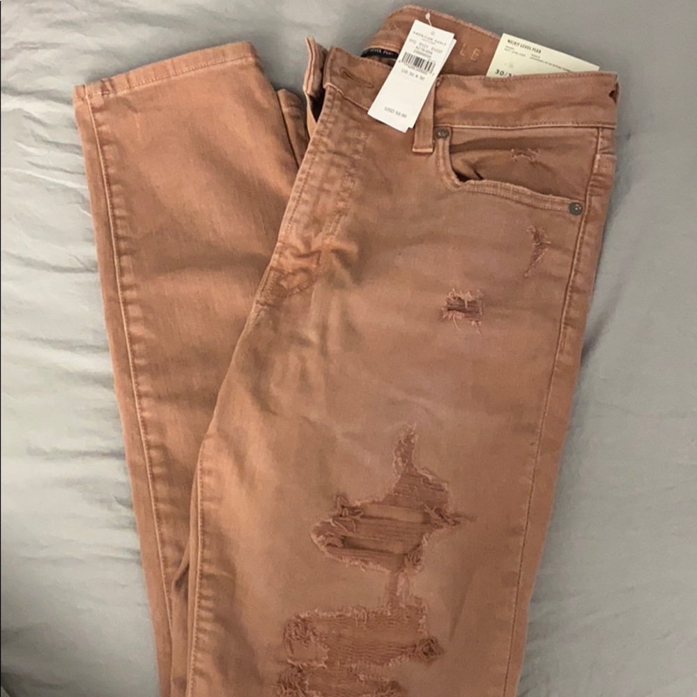 Salmon pink ripped skinny Jeans